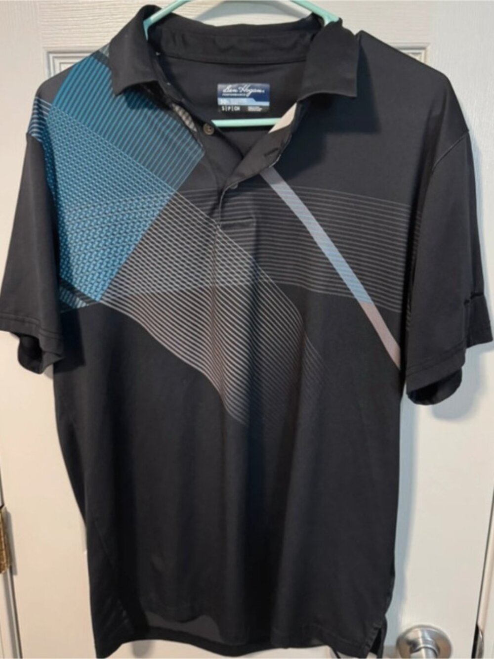 Ben Hogan Black Polo Shirt with Blue Graphic Accent